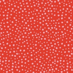 M|Geometric irregular light rose speckled polka dots on coral red