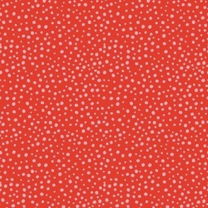 S|Geometric irregular light rose speckled polka dots on coral red