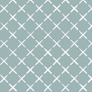 Faux cross stitch quilted diagonal crosses in white on teal - hand drawn large