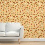 Treat Yourself to Carrot Cake Scattered with Orange, Browns, Yellow and Green as a Seamless Repeat Pattern Design