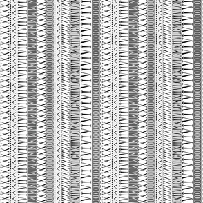 tribal_text_gray_vertical