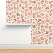 Sweet caramel cream cup cakes and delicate florals on light peachy orange background Large scale