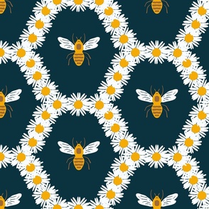 Camomile flowers and bees on navy