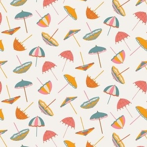 Tossed Beach Umbrellas in different shapes and colours – colourful parasols on an off white background in a small scale