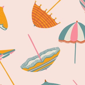 Tossed Beach Umbrellas in different shapes and colours – colourful parasols on a light pink background in a large scale