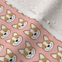 teeny tiny corgi faces on pink