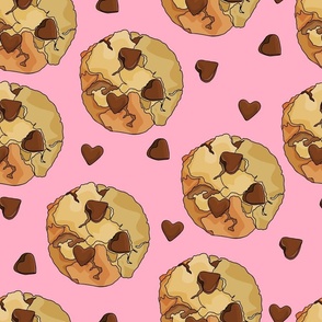 Heart Shaped Chocolate Chip Cookies on Pink Background