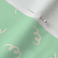 Cute-cuter-cutest-beige-white-spirals-on-soft-kitschy-mint-green-XL-jumbo