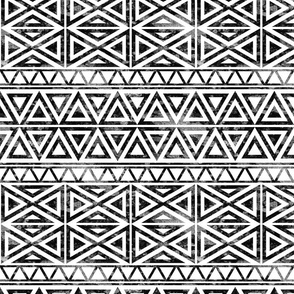 Distressed tribal triangles in black and white. Large scale