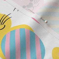 Cute bunnies with striped Easter eggs