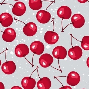 Cherry. Red cherry berries on a light gray background.