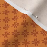 Abstrakt snowflakes in orange - small scale