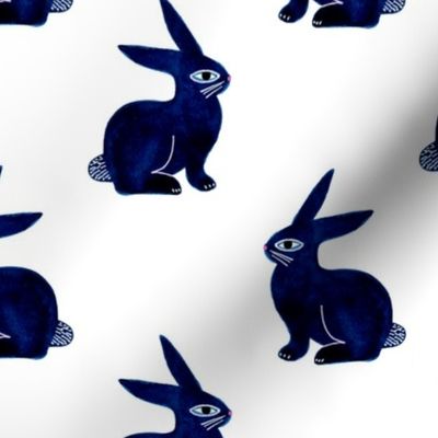 Dark blue rabbits on white background