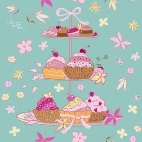 sweets and cupcakes spring party! cupcakes on  three tiered trays in pink, fuchsia, yellow on aquamarine blue