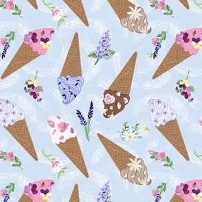 Small Flower Topped Ice Cream Cones on Pale Blue Texture