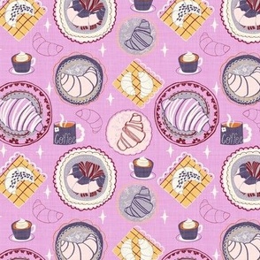 S|Textured Coffee and Blue Croissants Indulgent Treats on Decorated Plates and Yellow Napkins on pink