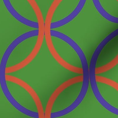 Geometric orange and purple circles on green