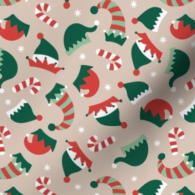 Christmas elves hats and candy cane with snowflakes - Happy Holidays retro magical kids design pink pine green red on beige neutral palette