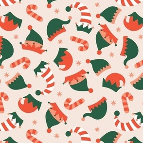 Christmas elves hats and candy cane with snowflakes - Happy Holidays retro magical kids design on blush sand