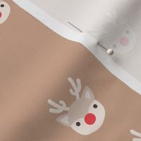 Little kawaii Christmas Rudolph reindeer with antlers and red nose on beige