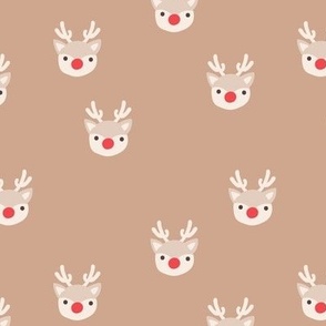 Little kawaii Christmas Rudolph reindeer with antlers and red nose on beige