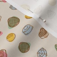 Luxury chocolates line art on beige