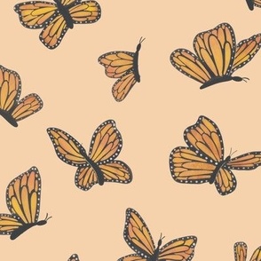 Orange Monarch Butterflies on Peach