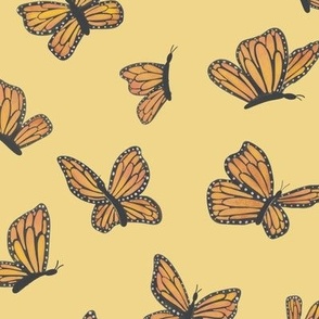 Orange Monarch Butterflies on Yellow