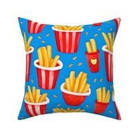 French Fries in red bowls on blue background (big scale)