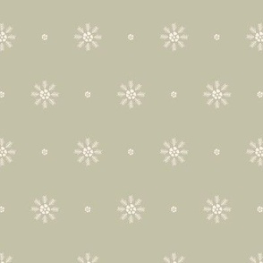 Sea flowers (M) polka dots in beige on pastel olive green background