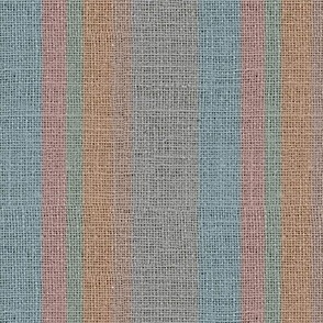 Large earthy neutrals in pastel shades of blue, orange, grey and coral pink on a burlap faux woven texture