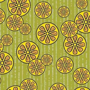 Festive Lemon Slices Tossed in Orange and Yellow on a Textured Green Background