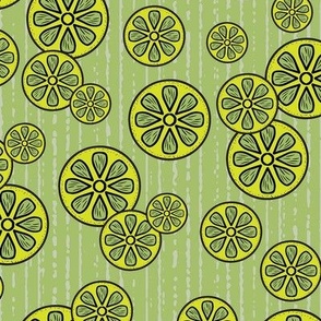 Festive Lime Slices Tossed in Green and Yellow on a Textured Green Background