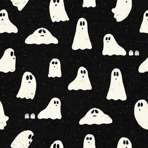 Spooky ghosts on Halloween night on a night black textured background - friendly ghost parade - friendly ghost parade