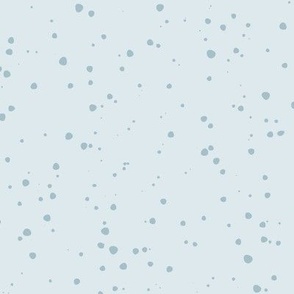 Denim Dots Scattered on a Light Denim Background