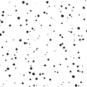 Black Dots Scattered on a White Background