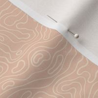 Small wavy watery textured block printed topographic lines in retro colors of rose blush on sandy cream