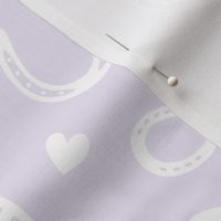 Horseshoes and Hearts white on pale lilac - medium-large scale