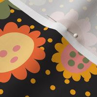 Scandi daisies and polka dots in retro colors on black. Large scale.