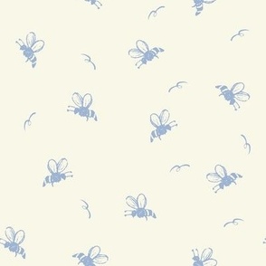 cream and pale blue bees