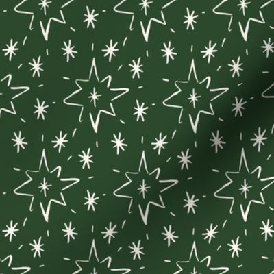 Stars hand drawn, kitsch Christmas star on pine green