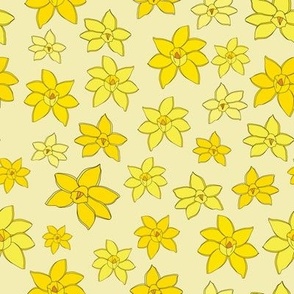 Hand drawn daffodils scattered in different shades of yellow on light yellow background