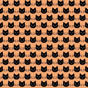 halloween kitty black cat face head whiskers silhouette black on orange one and half inch blender coordinate wallpaper bedding or accessories