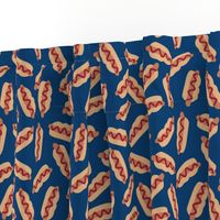 4th of July American street food - hotdog stand buns with sausage and ketchup tomato sauce usa food on navy blue