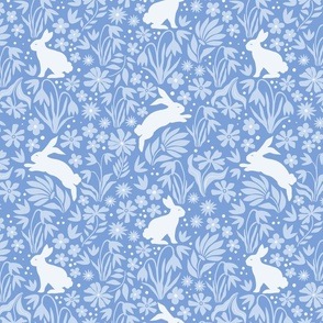 springtime bunnies and floral silhouettes/vibrant blue