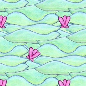 Pink shells floating in mint green waves
