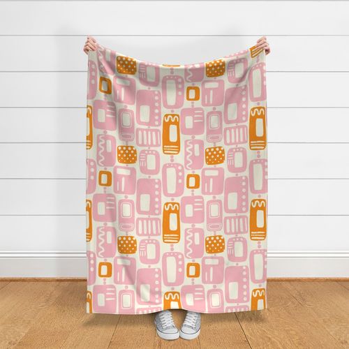 MID CENTURY MODERN SHAPES | 24" | Atomic era meets vintage block printing in this fun, abstract shapes pattern, inspired by 1970s colours of pink and vibrant orange on off-white background