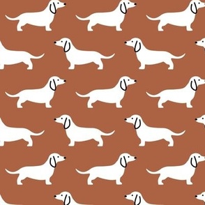 5.5x6 Cute Dachshund's on brown 