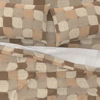 Large scale retro mod flower petal geometric in tones of  brown, peach, beige and gray with a linen texture.