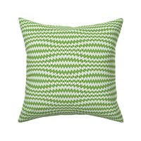 Green and white geometric wavy stripes.